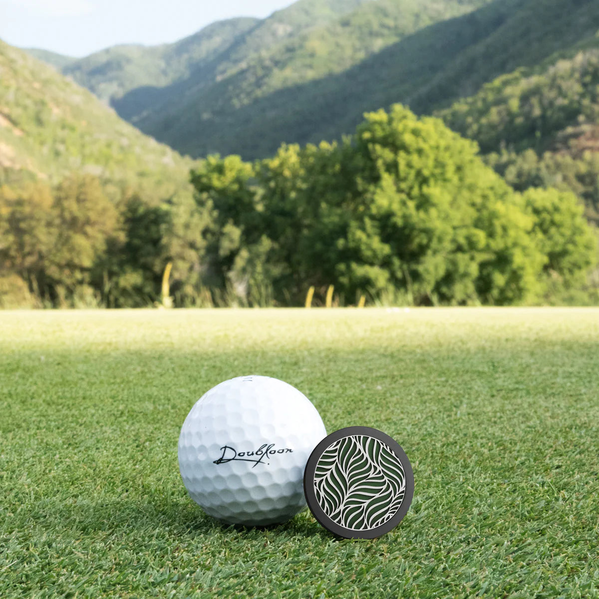 The Serengeti - Black Titanium & Sterling Silver w/ Green Cerakote Doubloon Golf Ball Marker
