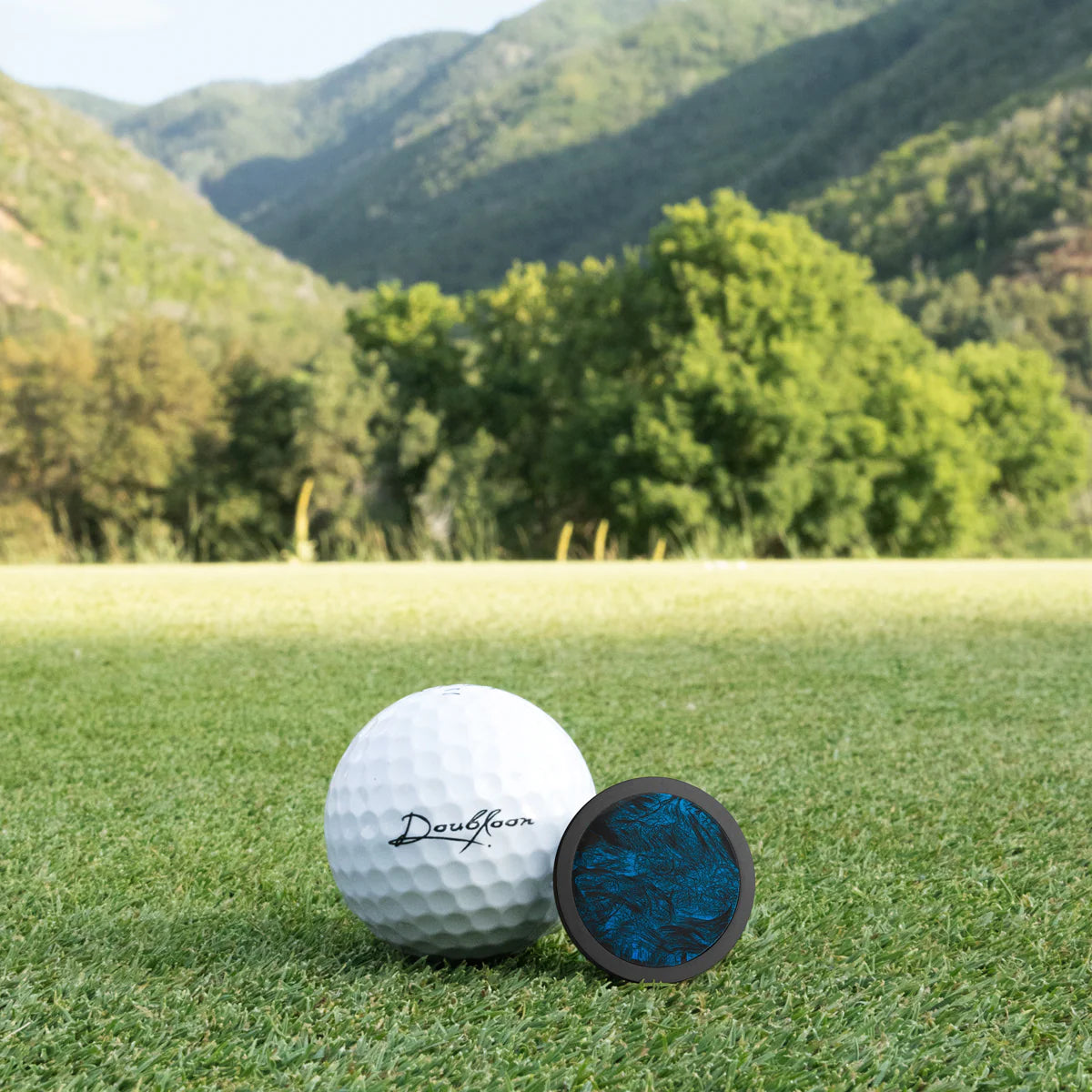 The Angler - Black Titanium & Blue Forged Carbon Fiber Doubloon Golf Ball Marker