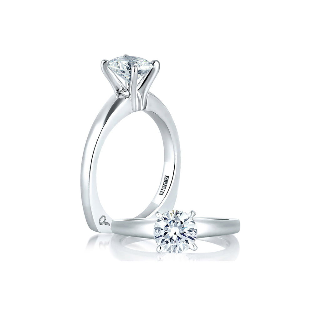 Solitaire Engagement Ring Embellished With a Four Prong Signature Head